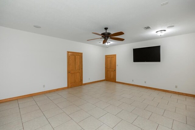 114 Holmes Rd, Lumberton, TX 77657 - spare room featuring a ceiling fan and baseboards