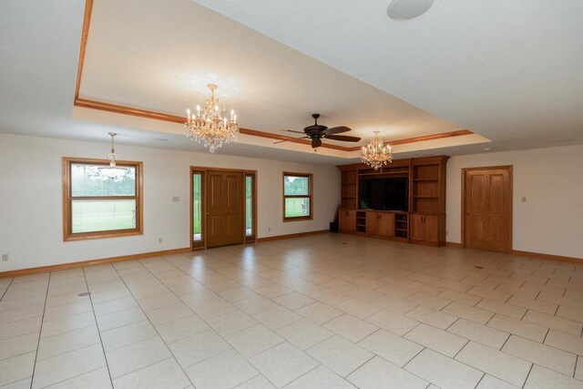 114 Holmes Rd, Lumberton, TX 77657 - unfurnished living room featuring a chandelier, a tray ceiling, baseboards, and ceiling fan