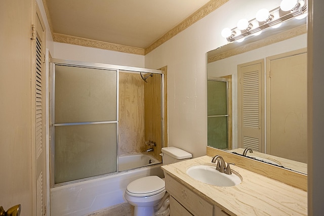 full bathroom featuring vanity, toilet, and enclosed tub / shower combo