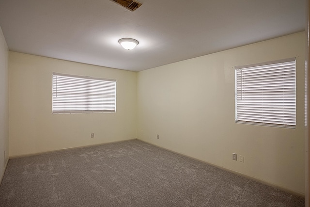 view of carpeted spare room