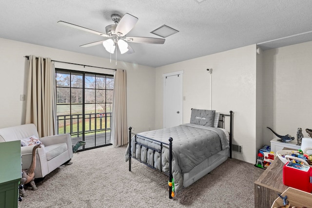 bedroom featuring visible vents, ceiling fan, carpet, a textured ceiling, and access to outside