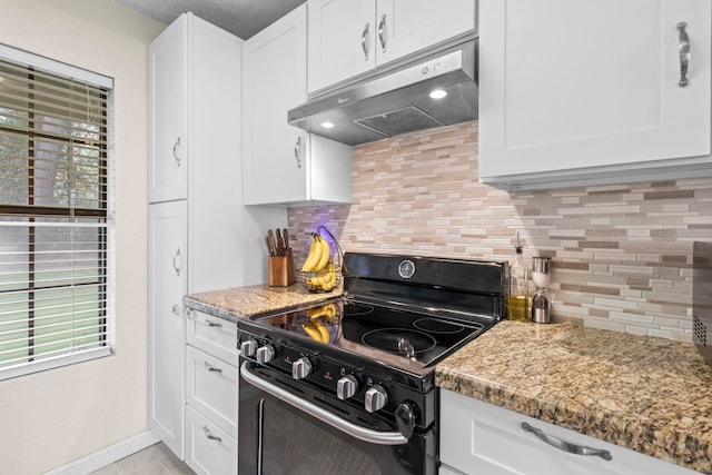 kitchen with backsplash, white cabinets, black range with electric cooktop, and under cabinet range hood