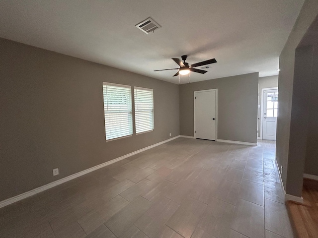 spare room featuring ceiling fan