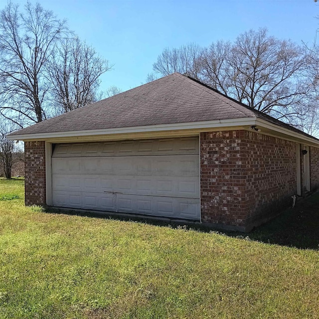 garage featuring driveway