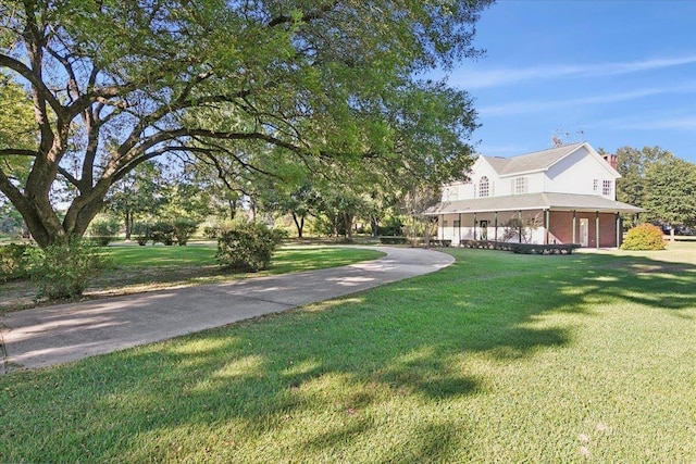 exterior space featuring a front yard