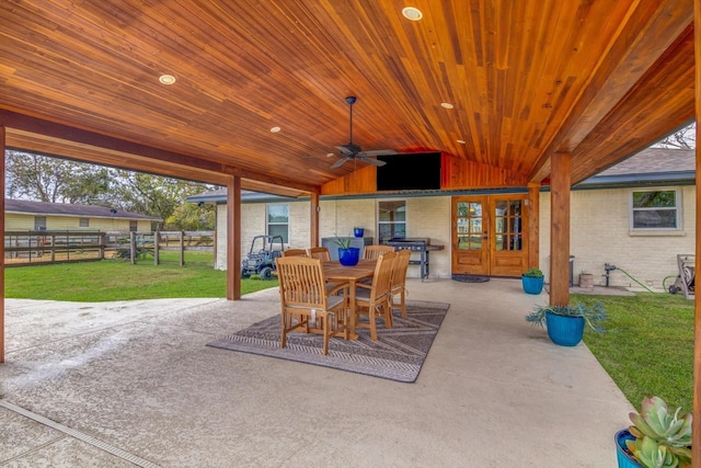 view of patio featuring ceiling fan and french doors