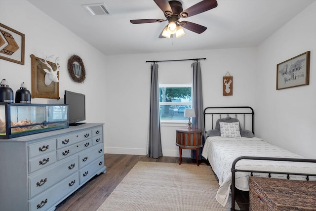 bedroom featuring dark wood-type flooring