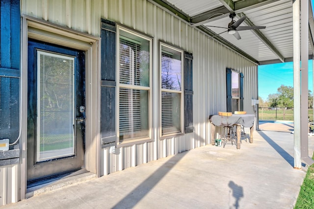 exterior space featuring covered porch and ceiling fan