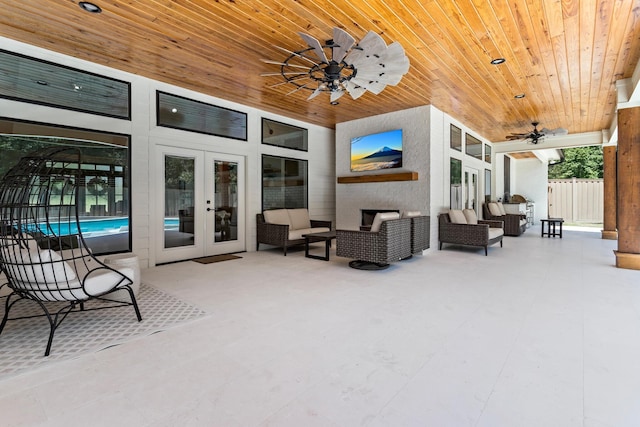 view of patio featuring an outdoor living space and french doors