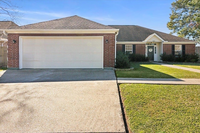 ranch-style house with a front lawn and a garage