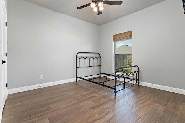 bedroom featuring dark hardwood / wood-style floors