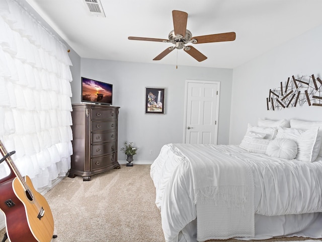 bedroom featuring ceiling fan and carpet floors