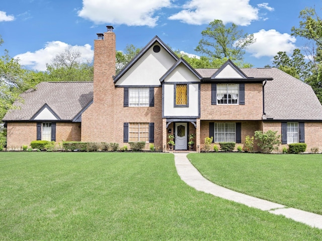 tudor house with a front lawn