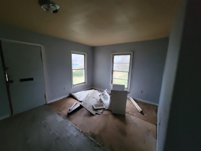 unfurnished bedroom featuring baseboards