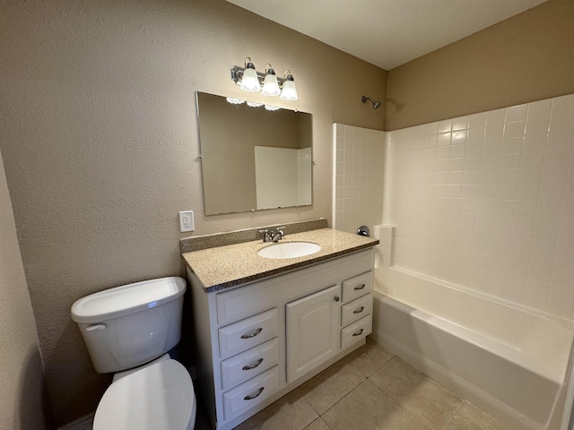 414 David St, Bridge City, TX 77611 - bathroom with toilet, tile patterned floors, shower / bath combination, vanity, and a textured wall