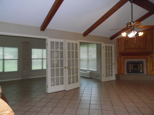 175 Isom St, Lumberton, TX 77657 - unfurnished living room with french doors, light tile patterned floors, a fireplace with raised hearth, ceiling fan, and a wall mounted AC