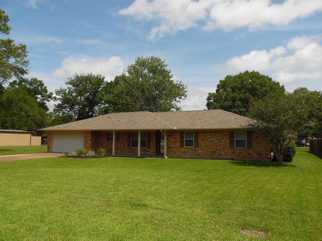 175 Isom St, Lumberton, TX 77657 - single story home with driveway, a garage, a front lawn, and brick siding