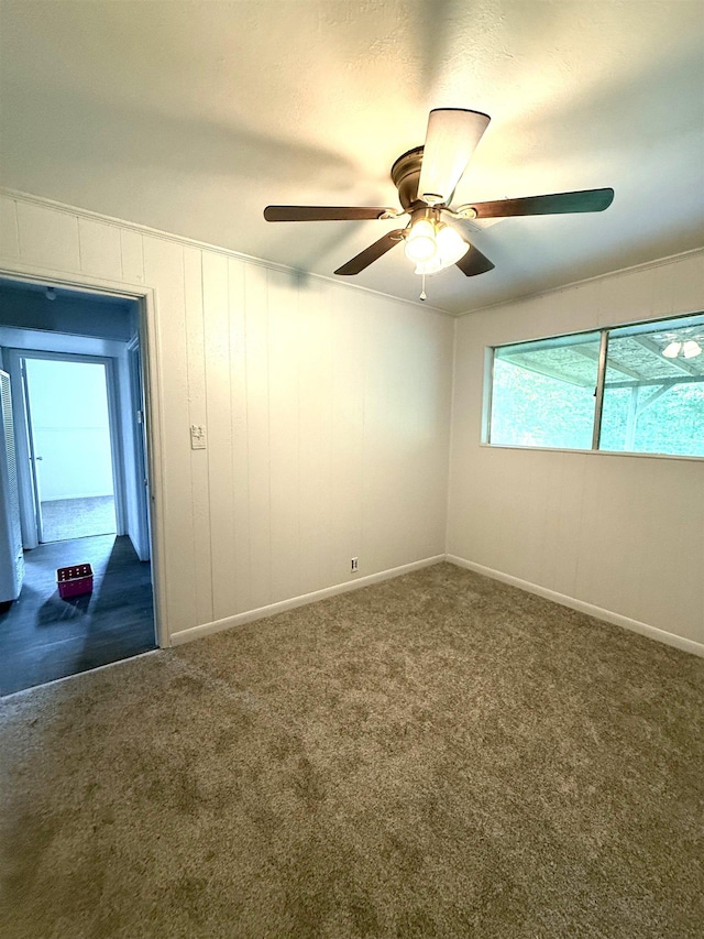 5335 Landry Ln, Beaumont, TX 77708 - carpeted spare room with ceiling fan and baseboards