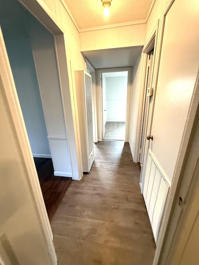 5335 Landry Ln, Beaumont, TX 77708 - hall featuring a heating unit and dark wood-style flooring