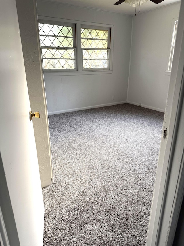 5335 Landry Ln, Beaumont, TX 77708 - carpeted spare room featuring ceiling fan and baseboards