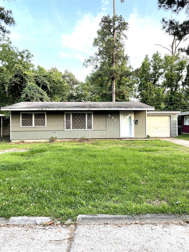 5335 Landry Ln, Beaumont, TX 77708 - single story home featuring a front lawn and driveway
