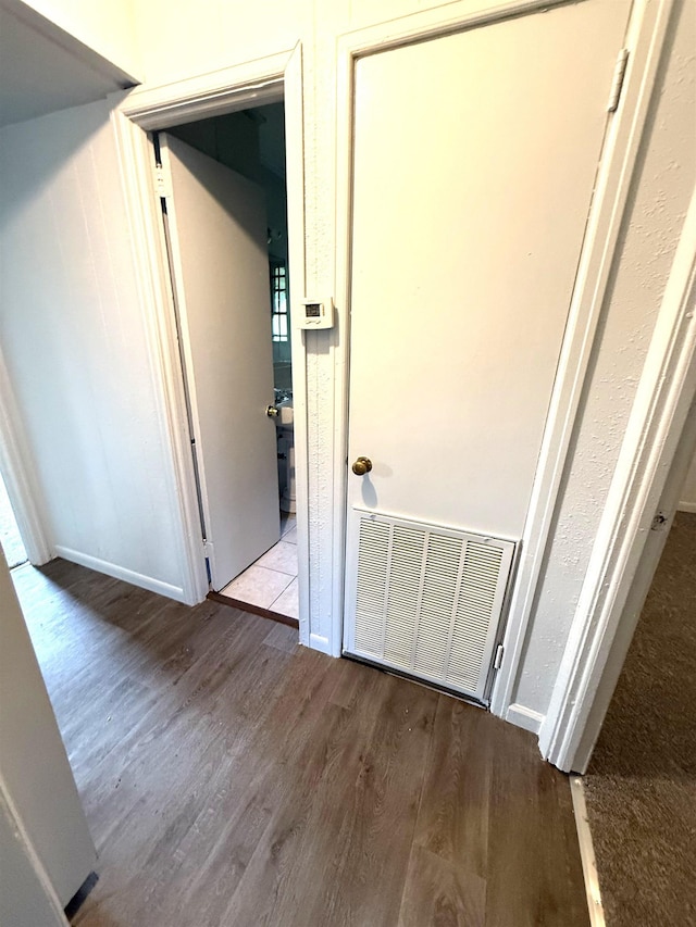 5335 Landry Ln, Beaumont, TX 77708 - hall with wood finished floors and baseboards