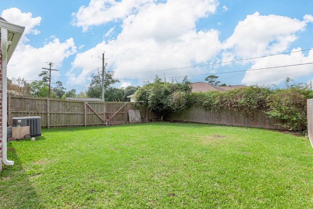 view of yard featuring central AC