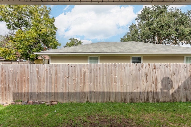 view of home's exterior featuring a yard