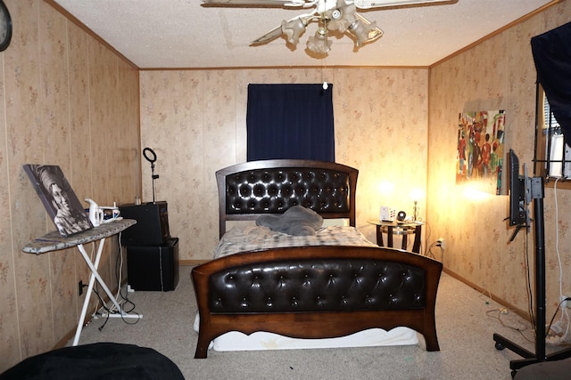 1720 Elgie St, Beaumont, TX 77705 - bedroom featuring carpet floors, crown molding, and a textured ceiling