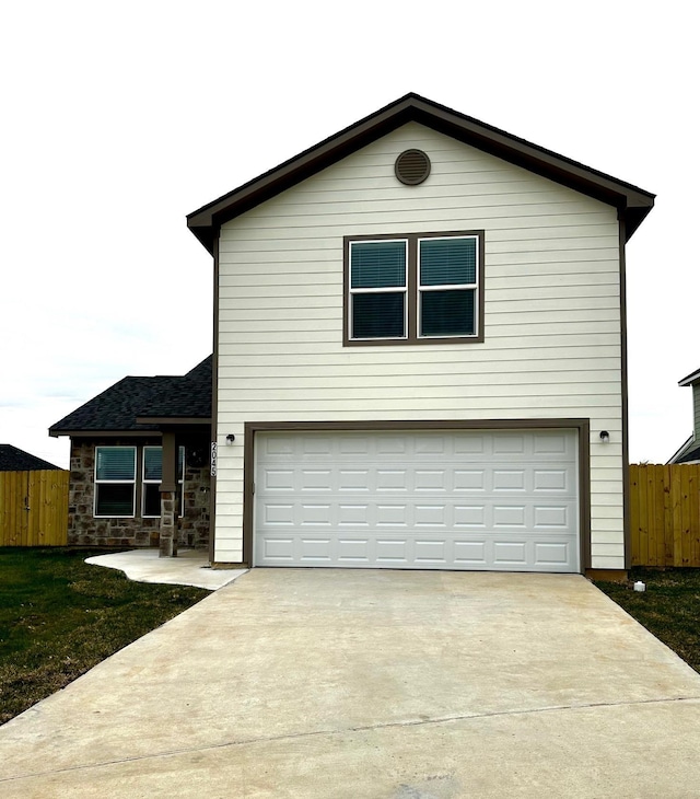 front facade with a garage