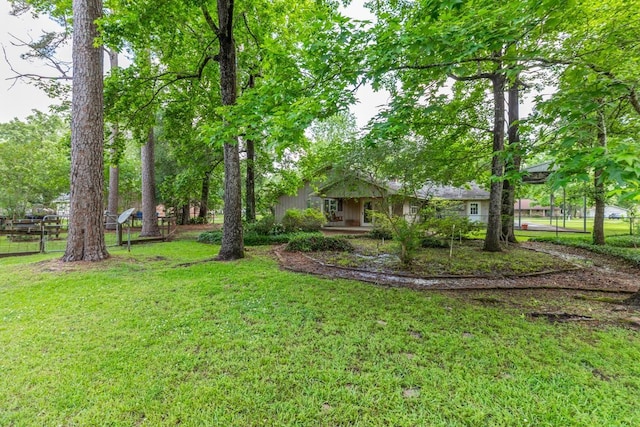 view of yard with fence