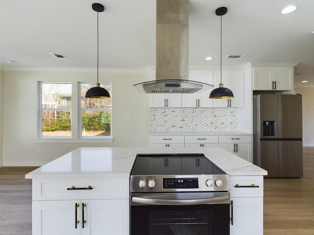 kitchen featuring appliances with stainless steel finishes, ornamental molding, white cabinets, island exhaust hood, and decorative backsplash