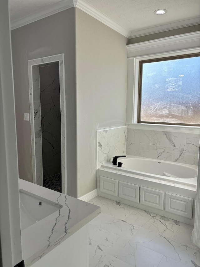 bathroom with shower with separate bathtub, crown molding, and sink