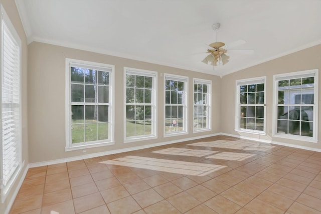 unfurnished sunroom featuring ceiling fan, plenty of natural light, and lofted ceiling