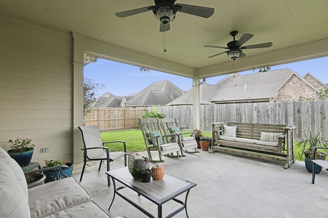 view of patio featuring outdoor lounge area and ceiling fan