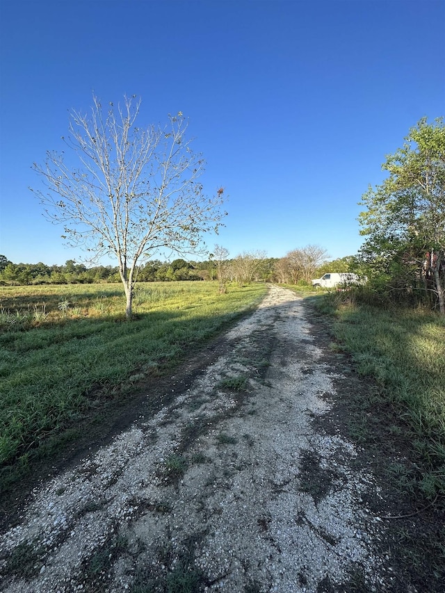 view of road with a rural view