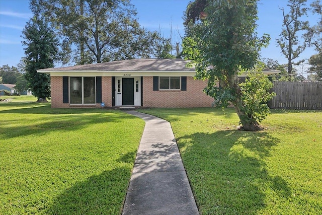 ranch-style house with a front yard