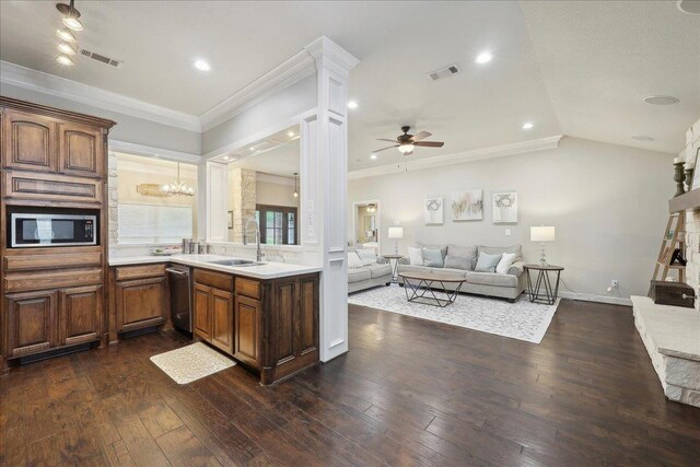 kitchen featuring a sink, stainless steel appliances, light countertops, ornamental molding, and visible vents
