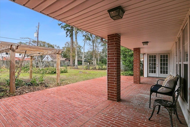 view of patio / terrace featuring french doors and a pergola