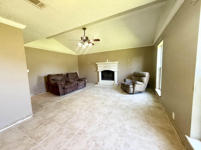 857 Sharp St, Bridge City, TX 77611 - living area featuring crown molding, lofted ceiling, ceiling fan, a fireplace, and light tile patterned flooring