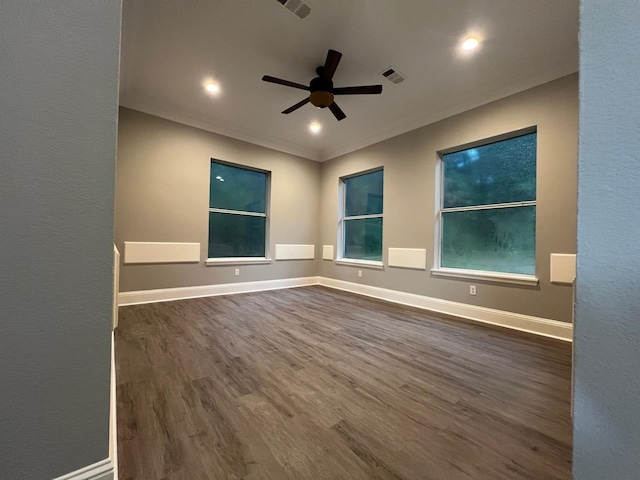575 Hartman, Silsbee, TX 77656 - unfurnished room with dark wood-type flooring, ceiling fan, ornamental molding, and recessed lighting