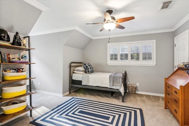 bedroom featuring ceiling fan, crown molding, lofted ceiling, and light carpet