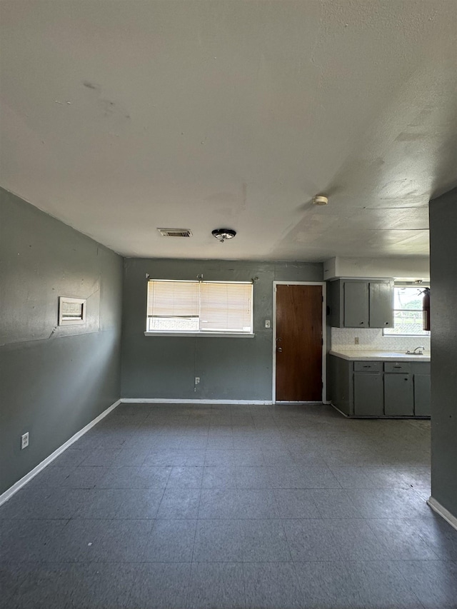 unfurnished room with sink