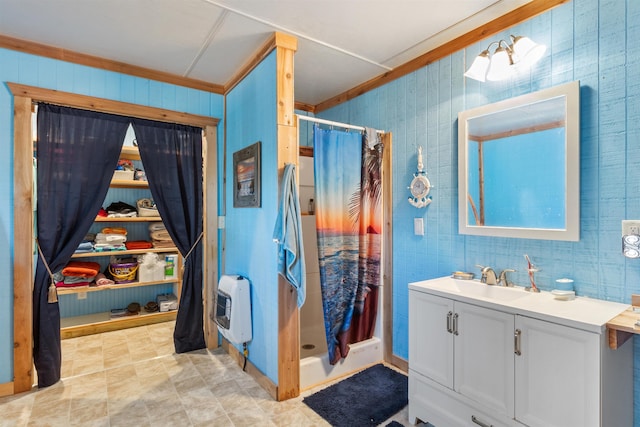 bathroom with vanity, heating unit, walk in shower, and ornamental molding