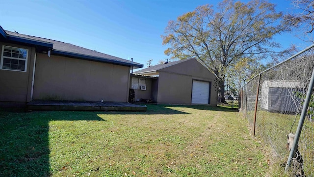 view of yard with a garage