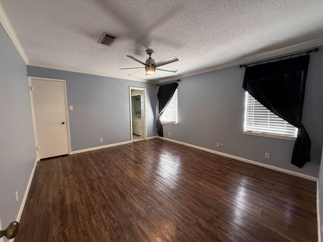 unfurnished room featuring hardwood / wood-style flooring, ceiling fan, and a textured ceiling