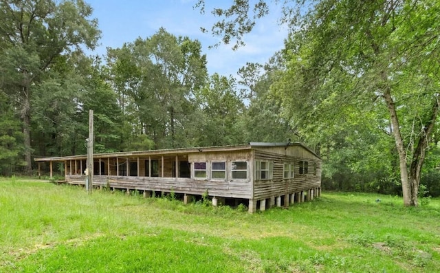 19995 S Fm 92, Fred, TX 77616 - back of house featuring a forest view