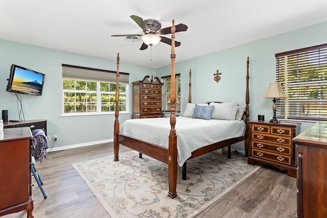 935 Nichols Dr, Beaumont, TX 77706 - bedroom featuring wood finished floors and a ceiling fan