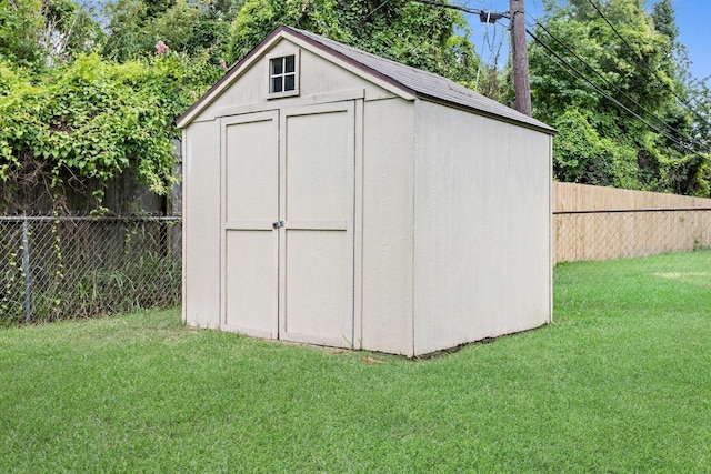 935 Nichols Dr, Beaumont, TX 77706 - view of shed featuring a fenced backyard
