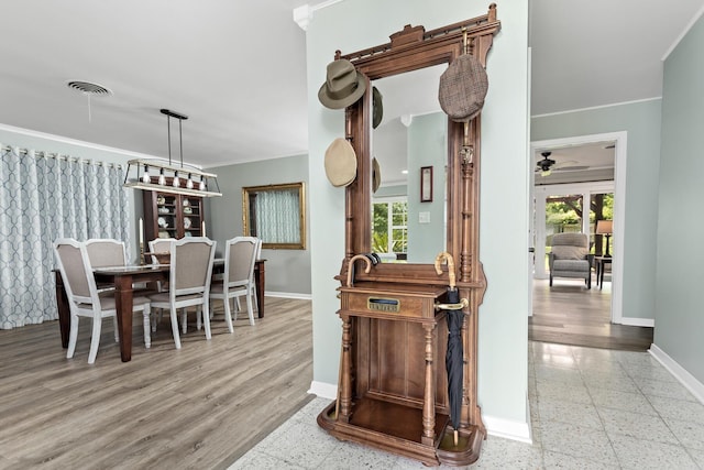 935 Nichols Dr, Beaumont, TX 77706 - dining room with ornamental molding and a ceiling fan